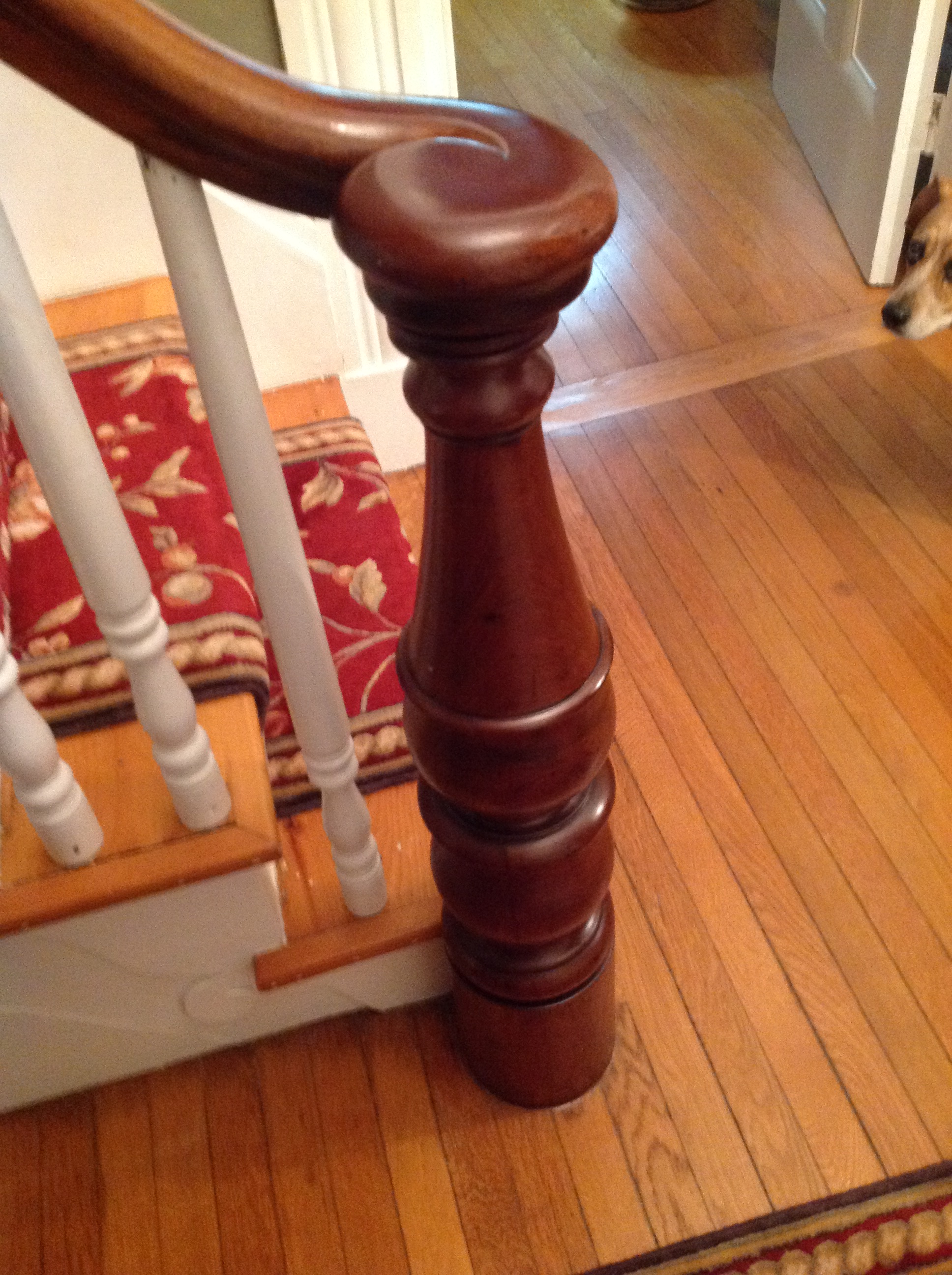 Cuban Mahogany Newel Post on front entry hall staircase